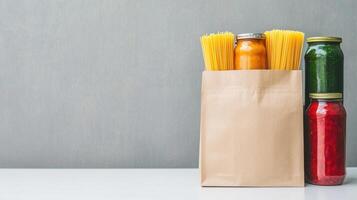 filled donation bag with Food pasta, sauces, vegetables, supporting community hunger relief efforts photo