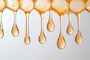 Golden honey cascading from with revealing rich amber flow honeycomb, glossy, sticky texture and natural sweetness photo