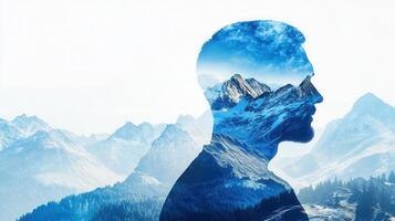 Mountain landscape with merging human silhouette, depicting inner wilderness, personal journey through tranquil snowcapped terrain photo