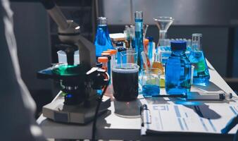 A laboratory table with many different types of liquids photo