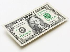 Dollar bill displayed on a flat surface, highlighting its features photo