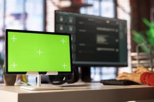 Freelancer typing prompts into AI chat interface on pc next to mockup screen, highlights the power of machine learning. Smart virtual assistant improves productivity and streamline communication. photo