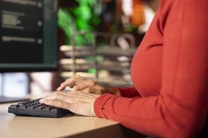Professional person engaging with an AI chatbot on a computer screen, exploring the power of digital assistance through artificial intelligence. Employ smart solutions for efficient assistance. photo