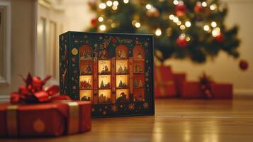 Illuminated christmas advent calendar on a wooden floor. photo