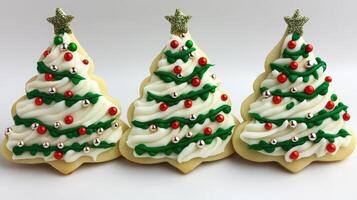 Festive Christmas tree-shaped cookies with decorative frosting. photo