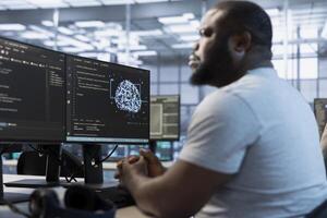 Admin in artificial intelligence server hub tasked with protecting valuable data against hacking attack on computers. AI expert safeguarding data center against unauthorized access and vulnerabilities photo