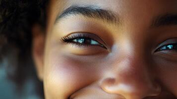 Close-up view of a joyful young person's face. photo