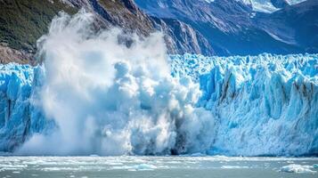Dramatic glacial calving event in a mountainous region. photo