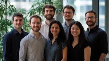 Group portrait of diverse young professionals in a modern office setting. photo