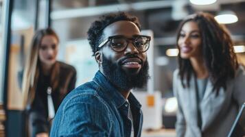 A diverse group of people in a modern office setting. photo