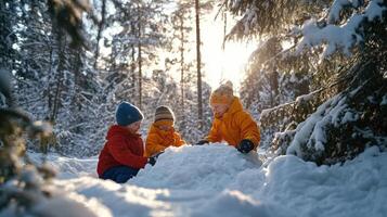 Three children build a snow fort in a snowy forest. photo