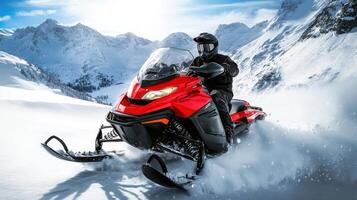 Person on snowmobile in snowy mountainscape. photo