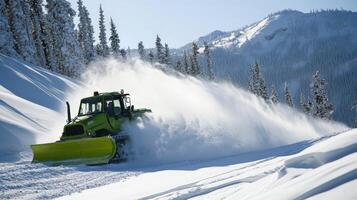 Snowy mountain path cleared by a tracked vehicle. photo