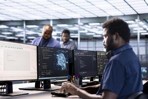 Server farm IT specialist using AI systems to input data faster during complex computational tasks. Software developer in data center using artificial intelligence parallel processing tech photo
