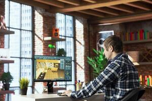 Freelancer working from home moving assets in 3D modeling program, doing interior design project. Teleworking interior designer using CAD software on PC, making home floor plans photo