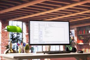 Programming code on PC display used for developing software programs. Binary script on computer at home used for fixing errors in applications and implementing new features photo
