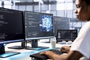Admin in server farm using artificial intelligence technology for increased productivity in startup company. Machine learning expert in data center implementing AI driven solutions photo