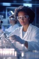 Diverse laboratory technicians analyze samples in modern lab setting with bright lighting photo