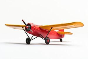 Realistic toy airplane in bright colors on a clean white background for creative use photo
