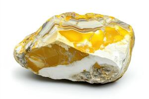 Mineral sample of yellow jasper showcasing vibrant colors and distinct patterns on a white background photo