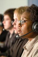 Diverse technical support team working collaboratively to assist customers through effective communication photo
