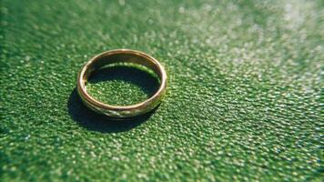 Macro shot of a golden ring on jeweler scale tiny reflections and fine surface details capturing value photo