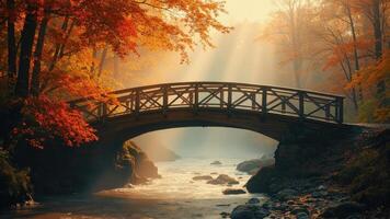 Autumn bridge over a rushing river with fall foliage landscape scene photo
