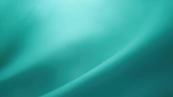 Abstract teal green background with smooth gradient flow and subtle light effects for modern design and presentation photo