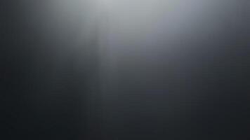 Abstract dark background with fading light and gradient tones for design and creative visuals photo