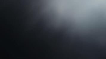 Abstract dark background with a smooth gradiant and shifting tones suitable for textures or backgrounds photo