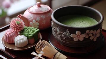 Exquisite Matcha Tea Ceremony with Traditional Sweets and Teapot in Serene Japanese Setting photo