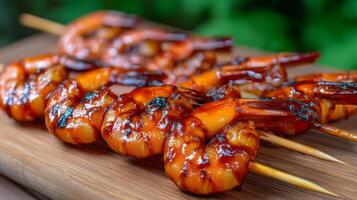 Grilled Shrimp Skewers Glazed with Barbecue Sauce on Wooden Sticks Ready to Serve at a Summer Outdoor BBQ Gathering photo