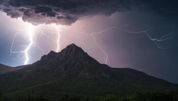 Majestic mountain landscape illuminated by powerful lightning strikes during a dramatic storm with dark clouds overhead photo