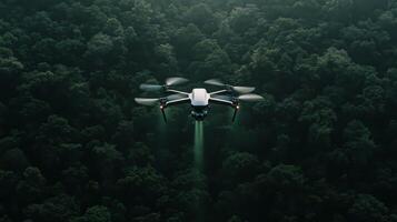 A drone flying over a forest with trees photo