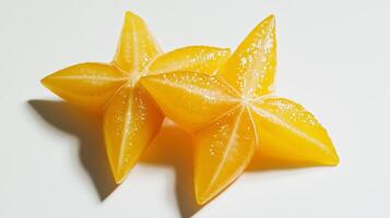 A pair of orange star shaped fruit photo
