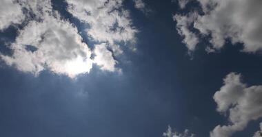 beautiful sky with lush white clouds in sunny bright weather, natural blue sky with cumulus clouds photo