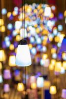 Beautiful colorful lamps with colorful bokeh lights visible from background. photo