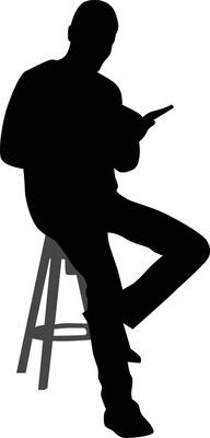 silhouette of man sit down reading book