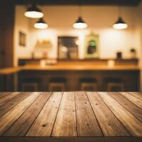 Wooden table top with blurred bar counter photo