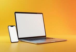 laptop and smartphone on yellow background photo