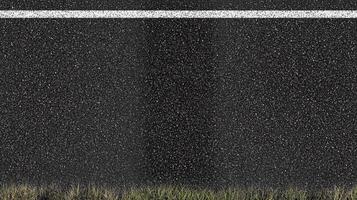Asphalt road texture with grass edge and white line for background or design concept photo