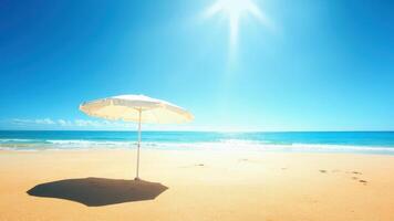 Beach umbrella on the beach with sun shining on it photo