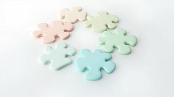 A group of colorful puzzle pieces arranged in a circle photo