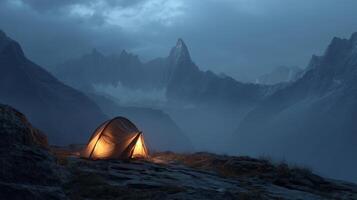 Glowing tent in dark misty mountains under cloudy sky, hiking adventure at night photo