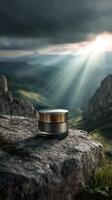 Luxurious cream jar on stone with sun rays in a dramatic mountain landscape photo
