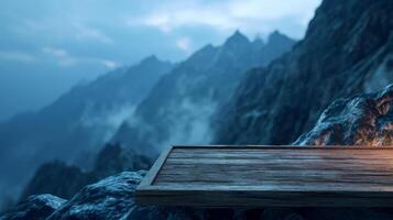 Wooden table on mountain peak with misty blue landscape, tranquil and serene photo