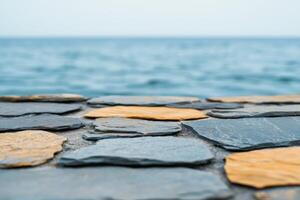 Coastal Stone Pathway by the Ocean. A beautiful stone pathway leading to the sea. Unique stone pattern and textures. photo