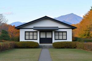Elegant White House with Autumnal Landscape photo