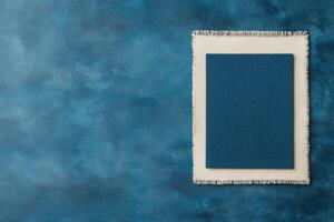 Elegant Blue and Cream Napkin Composition on Textured Background photo