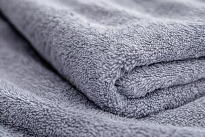 of a luxurious grey towel, perfect for a relaxing bath time photo